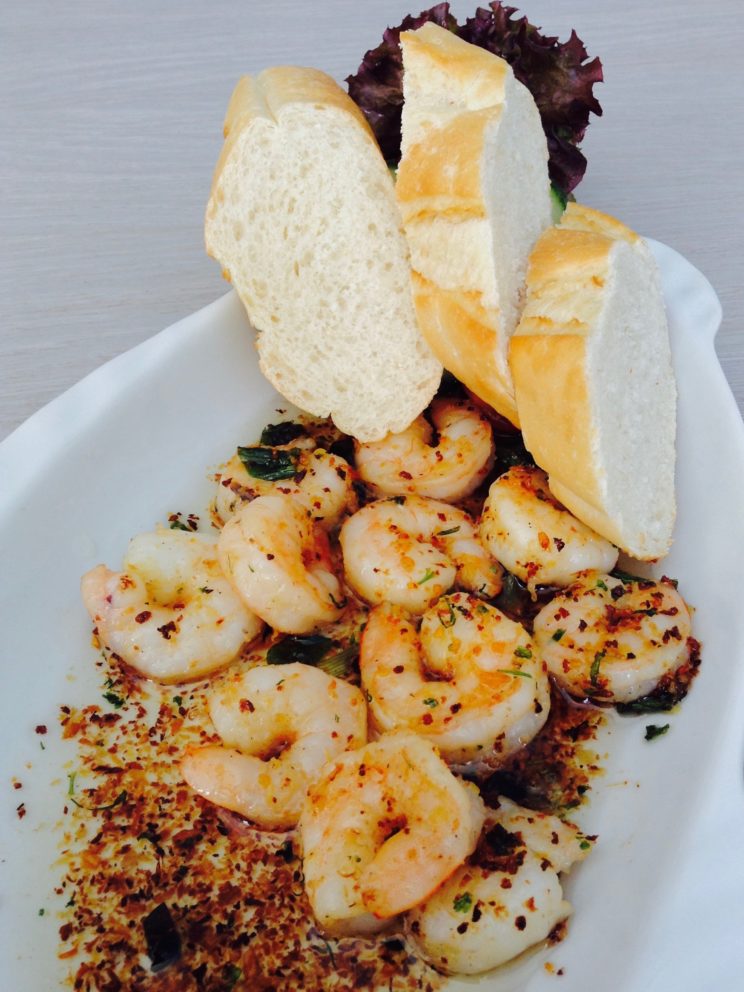 In Knoblauchöl gebratene Garnelen